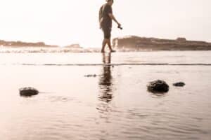 man walking on beach