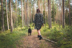 Woman Who Uses Buprenorphine With Naloxone (Generic Suboxone®) Walking With Dog