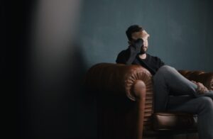 Man Getting Counseling To Improve Addiction Recovery