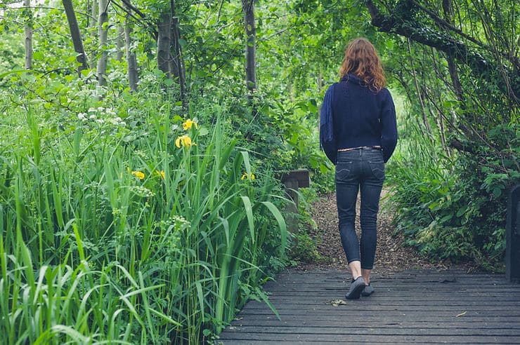 woman walking with decreased energy