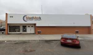 MedMark Treatment Centers storefront with street parking